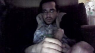 A guy masturbates his dick with his hand until he comes