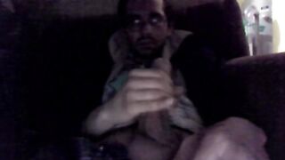 A guy masturbates his dick with his hand until he comes