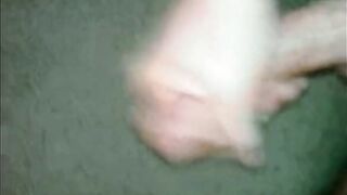 A guy masturbates his big dick until he comes