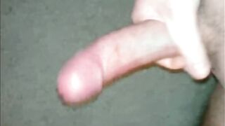 A guy masturbates his big dick until he comes