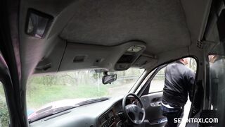 A hot blondie is having fun with taxi driver in the back of his car