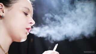 Topless Brunette Smoking in Dramatic Smoke