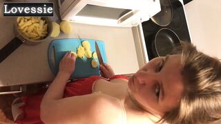 A MILF slave prepares dinner for
