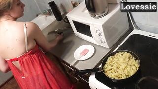 A MILF slave prepares dinner for
