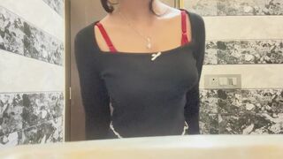 Sexy babe showing her boobs in